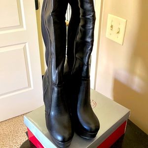 Black above the knee 4 inch boots